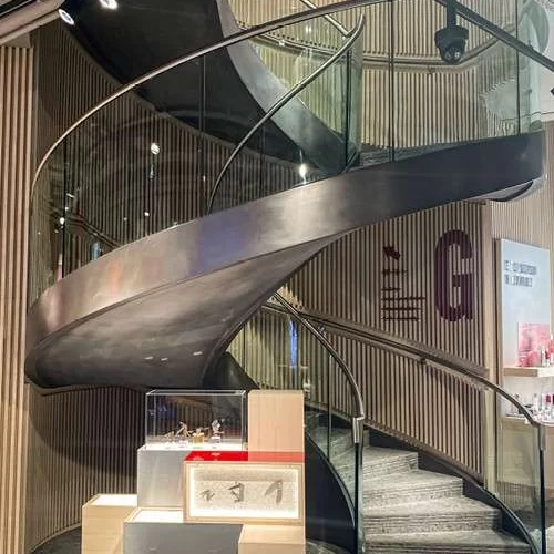 Victorinox Spiral UK Helical Staircase Bespoke Manufacturer cantilever floating stairs dog legged straight London Fit Out
