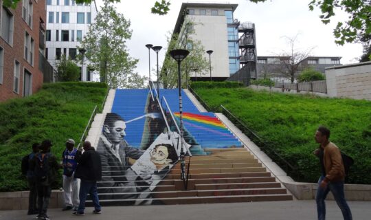 Painted staircase with a prism and image of Walt Disney and Salvador Dali